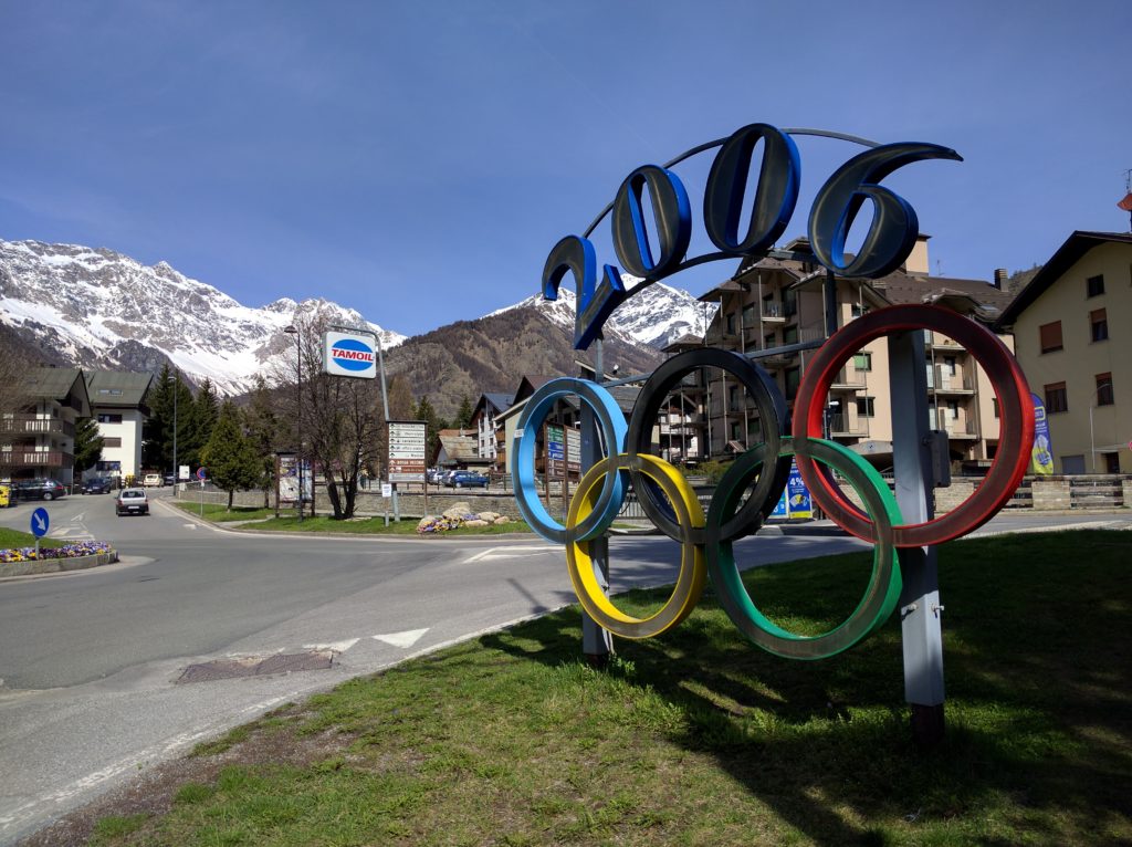 2006 olympic sign with alps in backround